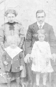 Catherine Black and Alexander Cruden with children Stewart and Margaret. Circa 1912.