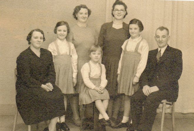 Ramsay family portrait: standing: Elizabeth, May, Cathy, Margaret. Seated: Margaret Cruden, Sandra and David Ramsay. c. 1944-45