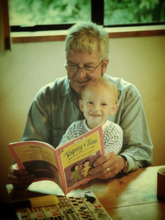 The boy-child with his grandfather. Fortunate to live in a family in which everyone loves books. Photo: Su Leslie, 2000